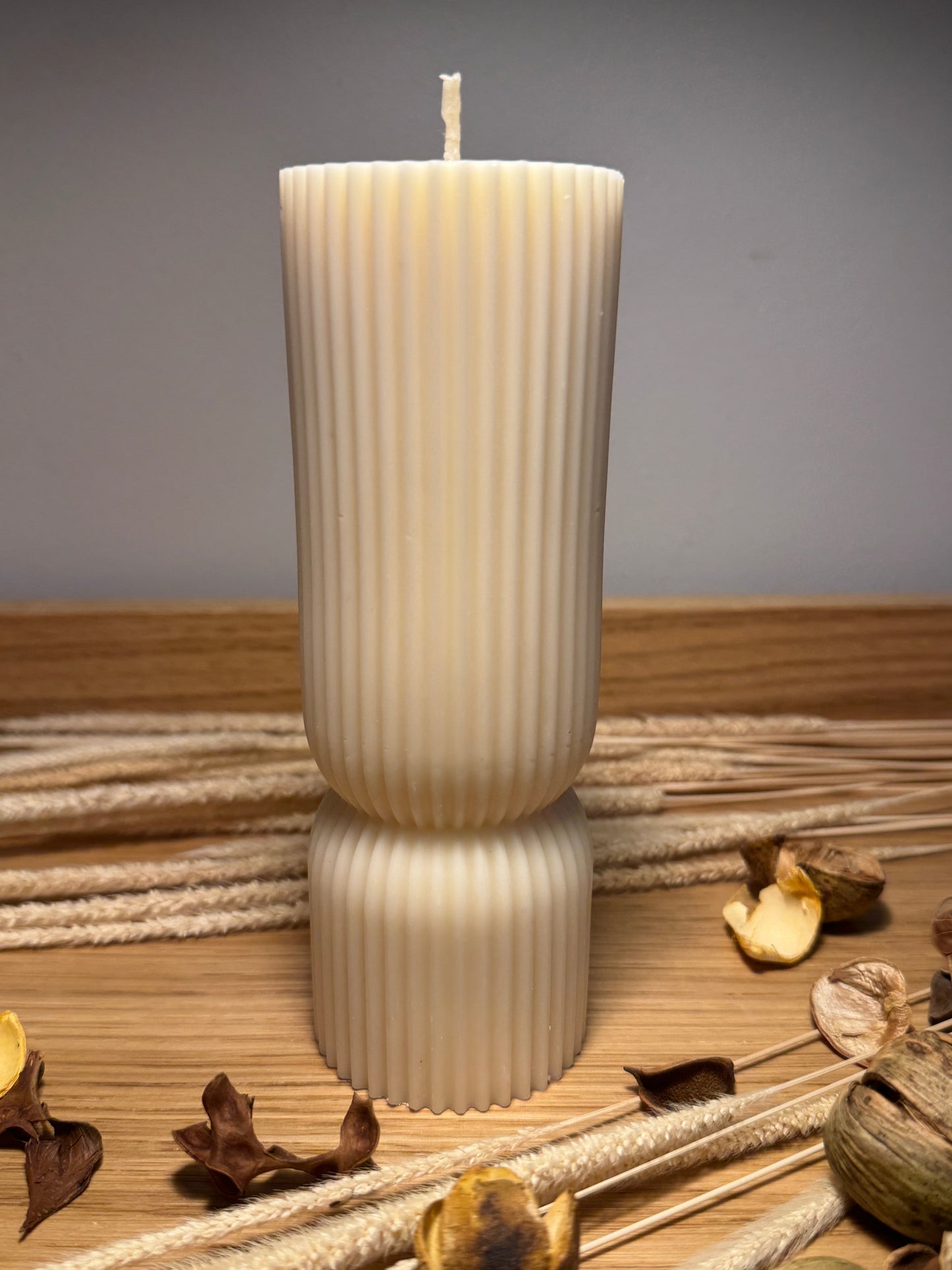 Ribbed hourglass pillar candle