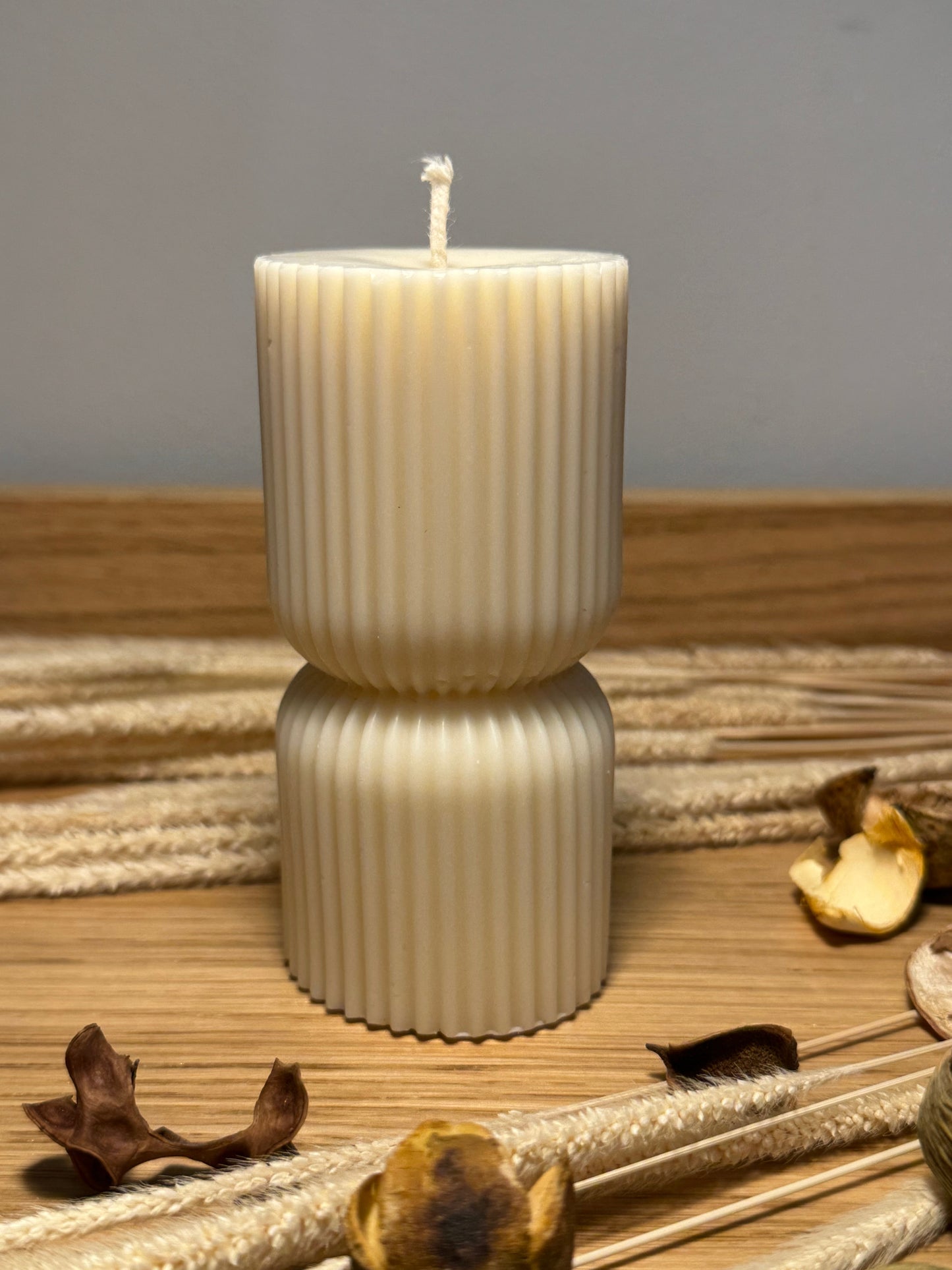 Ribbed hourglass pillar candle
