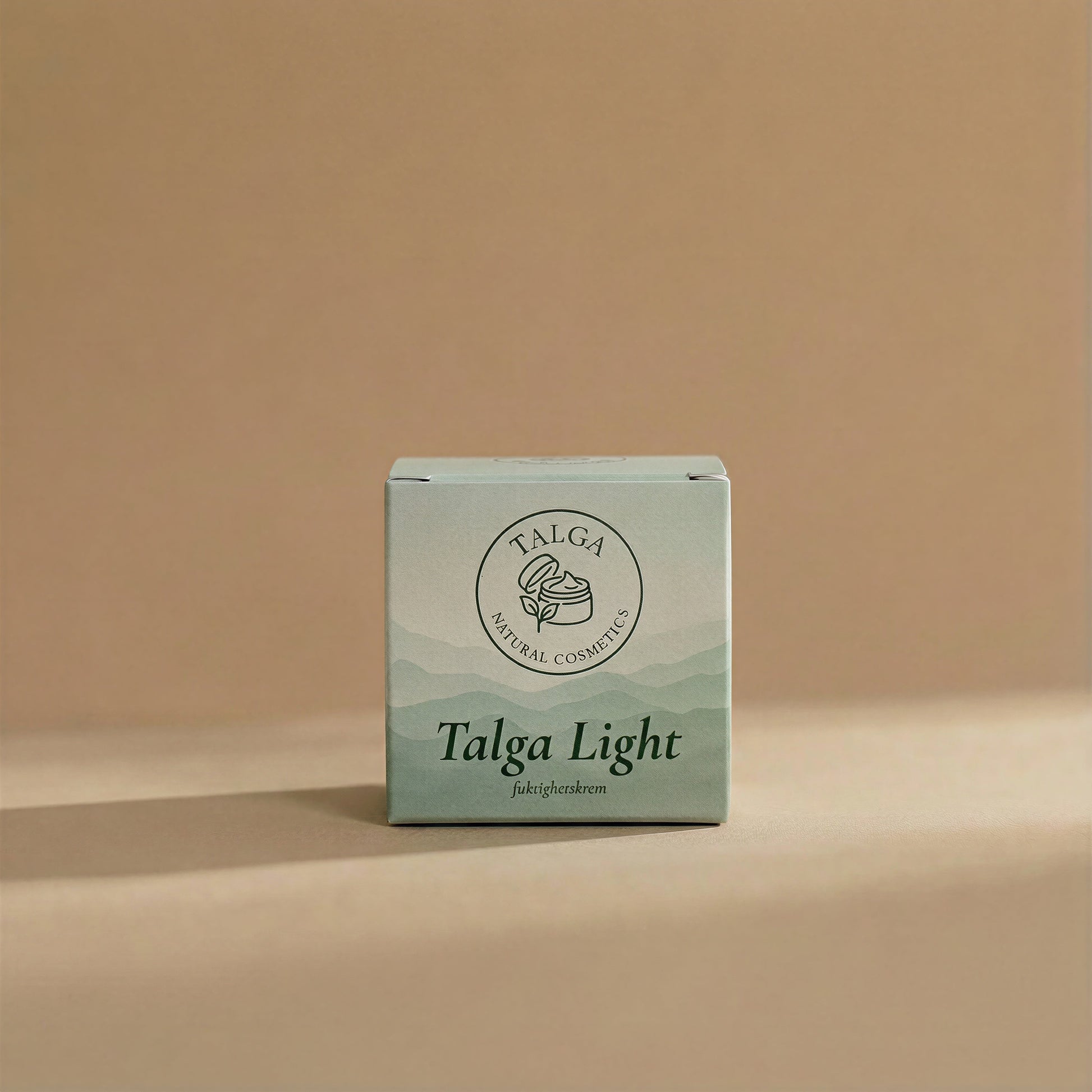 Front view of the Talga Light fuktighetskrem box on a beige background with the Talga Natural Cosmetics logo.